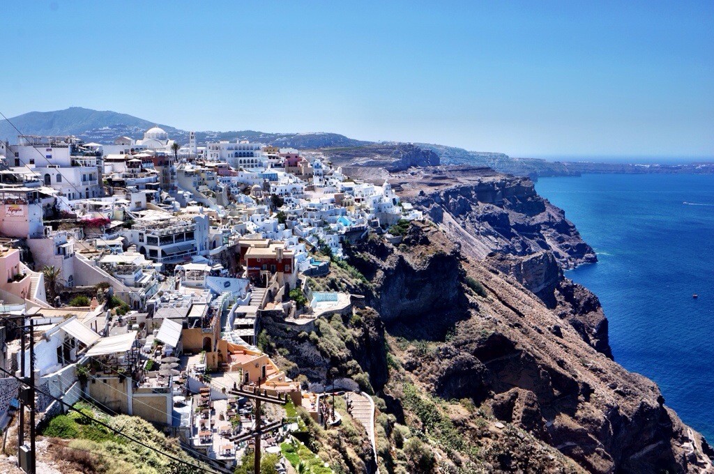 Don't be fooled! Santorini isn't just for honeymooners. Here's how to have fun on a girl's trip to the famous Greek island.