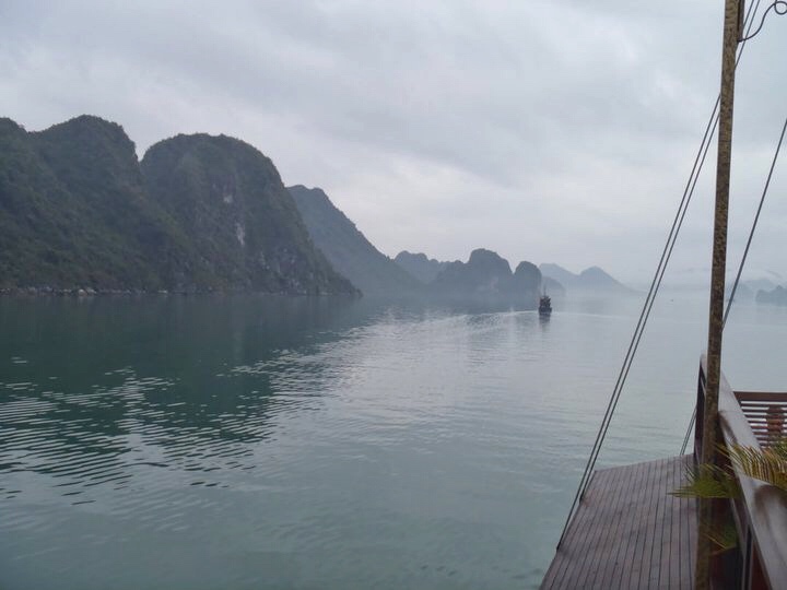 Even on a gloomy day, Ha Long Bay in Vietnam is beautiful.