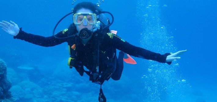 Even first timers can scuba dive in the Great Barrier Reef with the help of a guide.