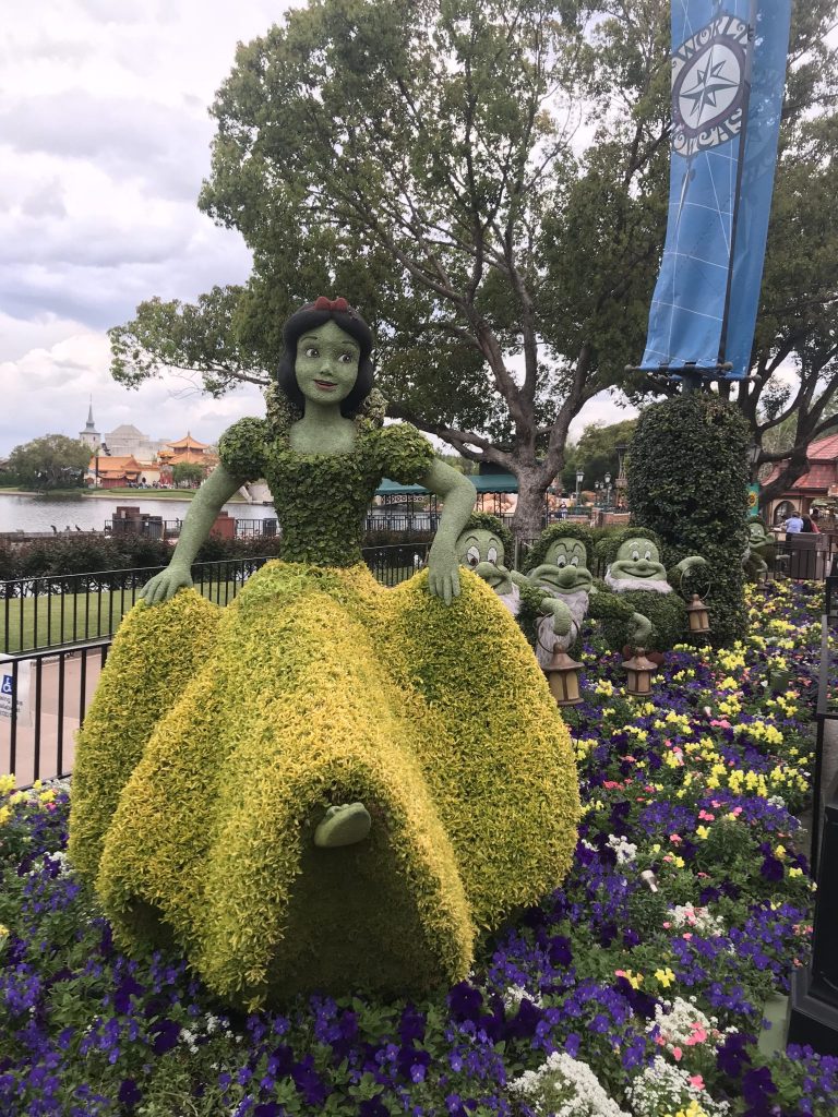 Don't miss Snow White and the Seven Dwarves at Disney World's Flower and Garden Festival.