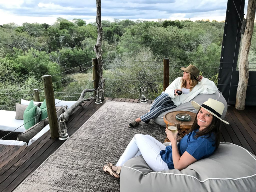 Enjoy sundowners with a view while staying at Ivory Lodge's exclusive treehouse.