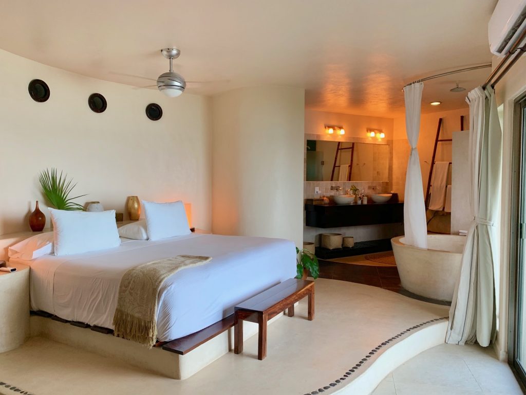 The Master Suites at Tulum's Mezzanine Hotel feature a king-sized bed, air conditioning and a private balcony overlooking the Sea.