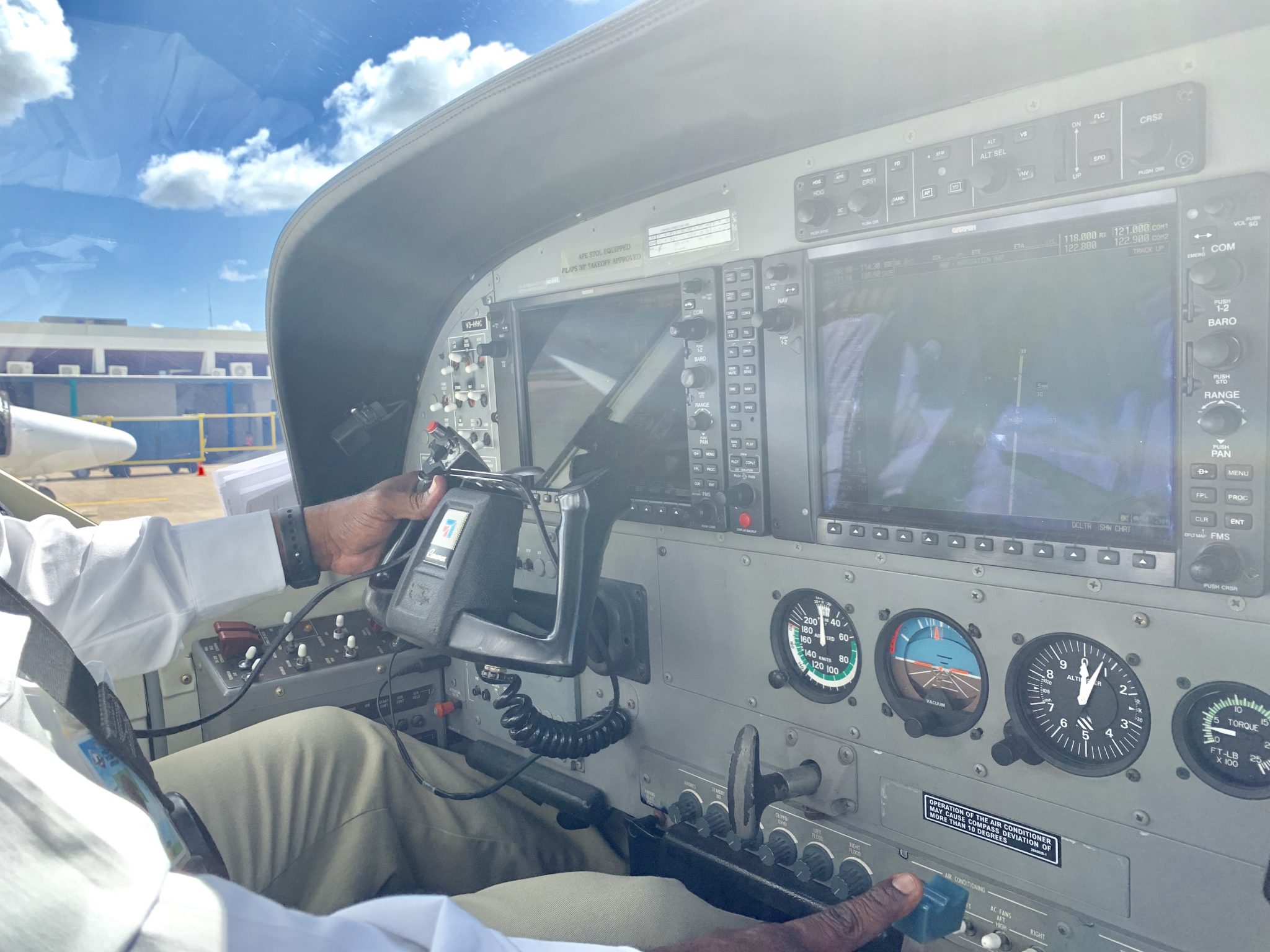 Try to board the puddle jumper to Caye Caulker, Belize last so you have a chance to sit in the cockpit.