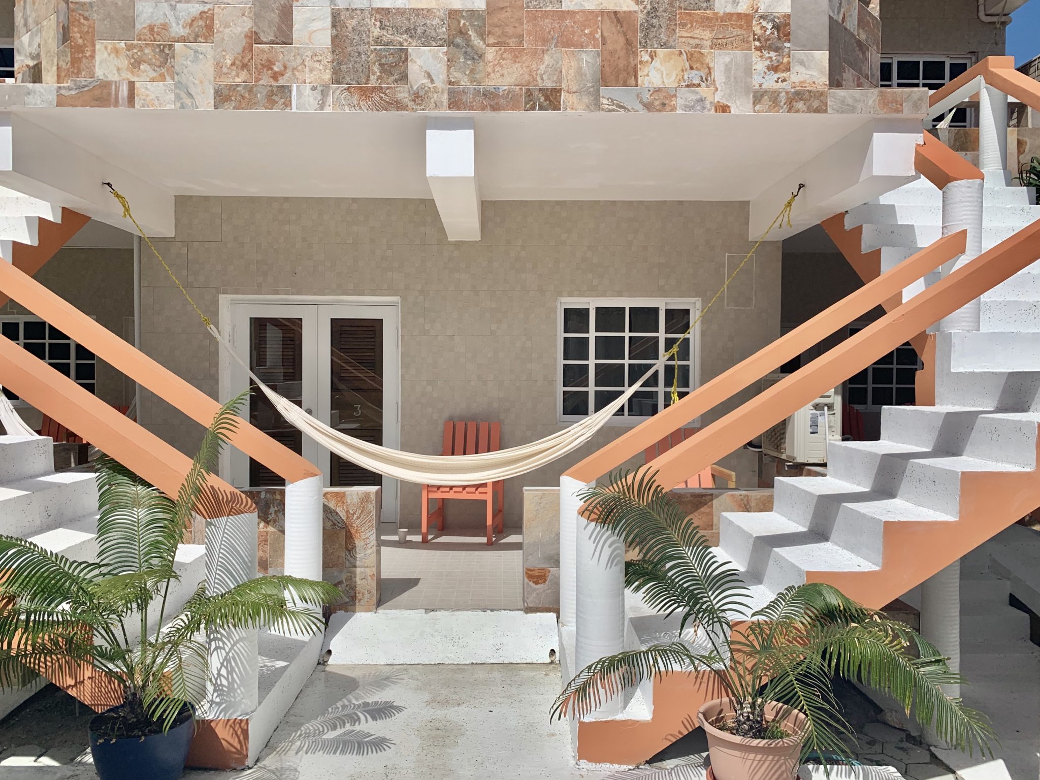 Take a break in a hammock at the Island Magic Hotel on Caye Caulker, Belize.