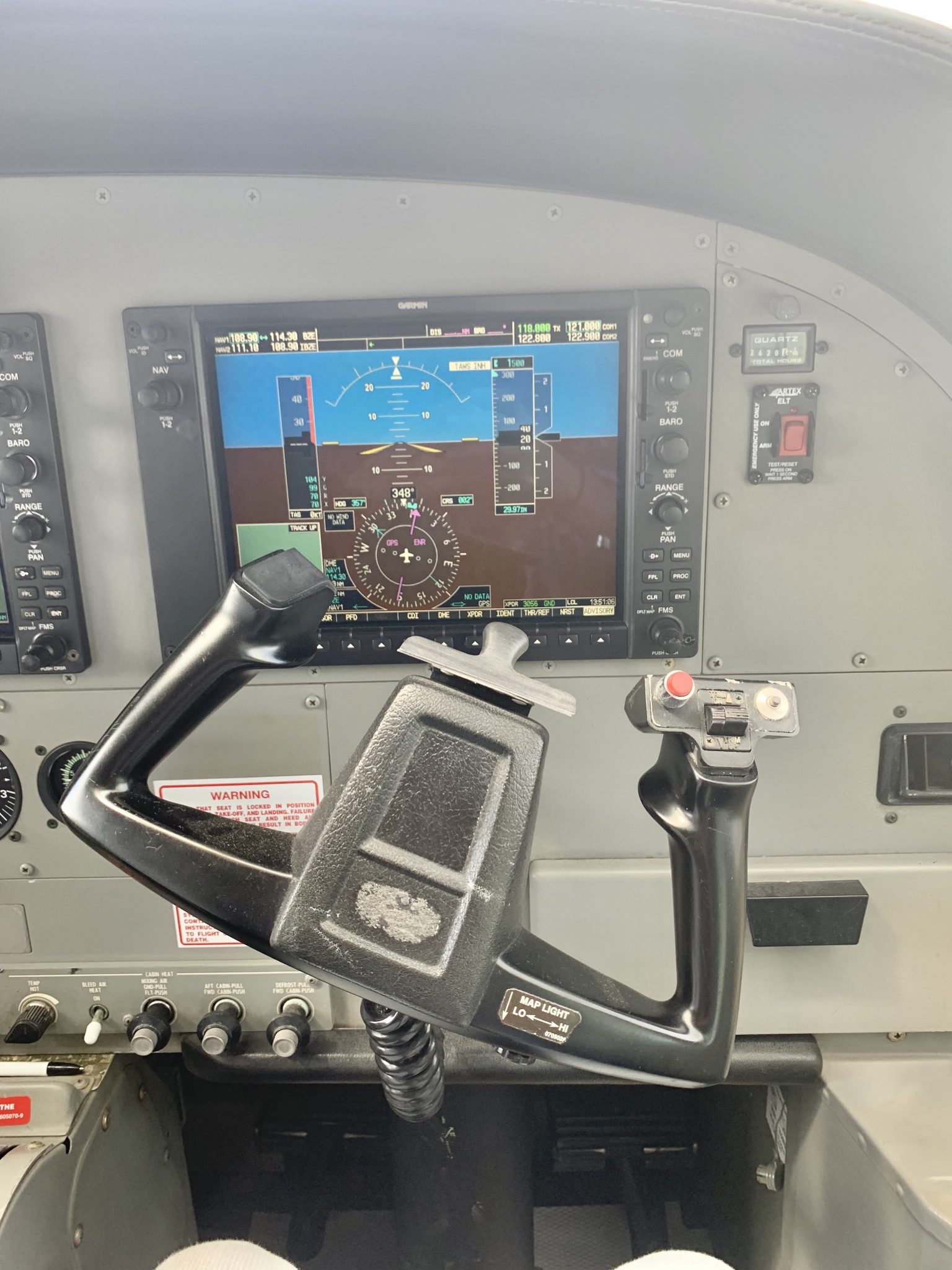 You can sit in the cockpit on your flight to Caye Caulker, Belize.