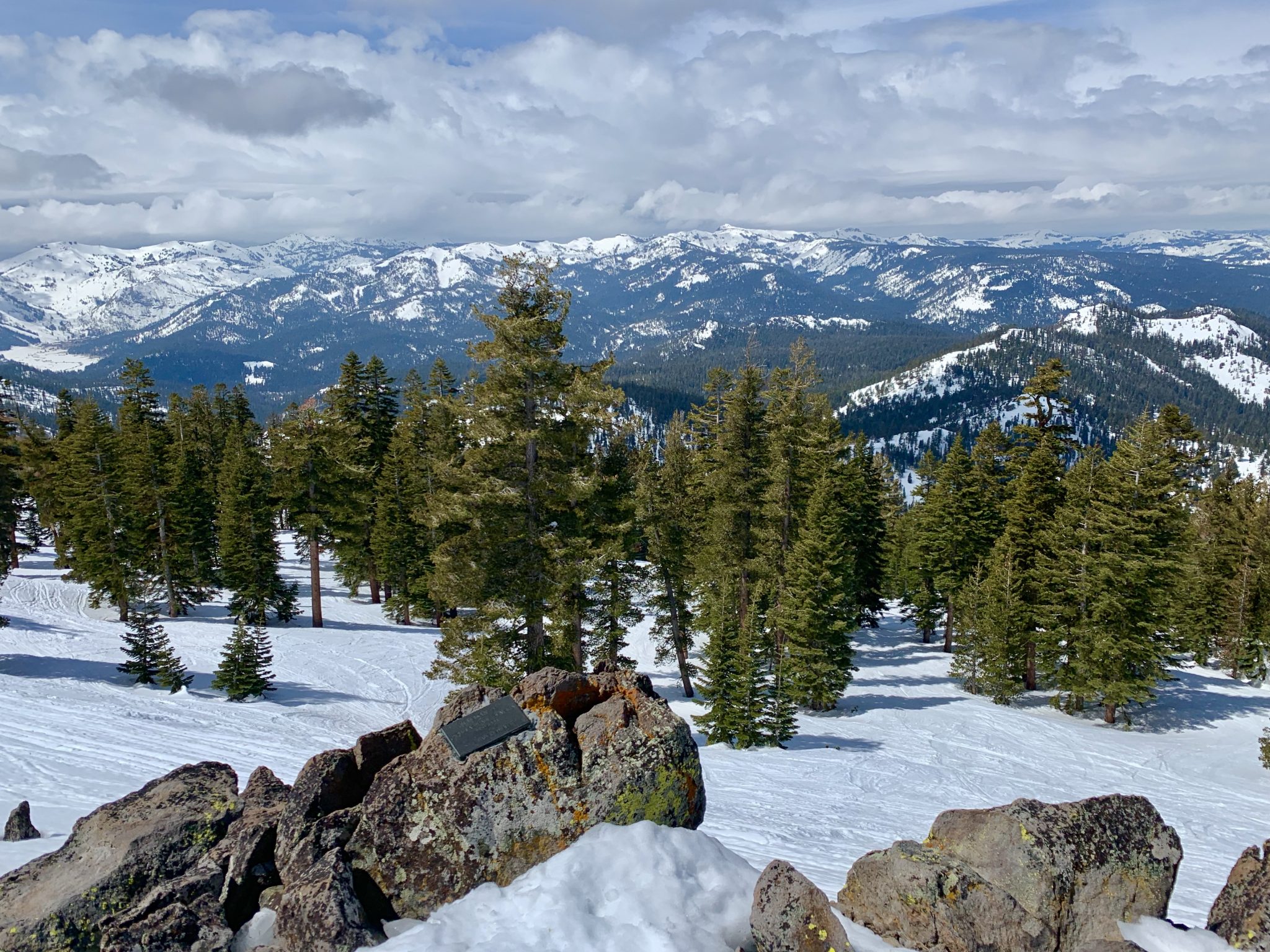 Catch these beautiful views of snowcapped mountains during spring skiing at Lake Tahoe's Northstar resort.