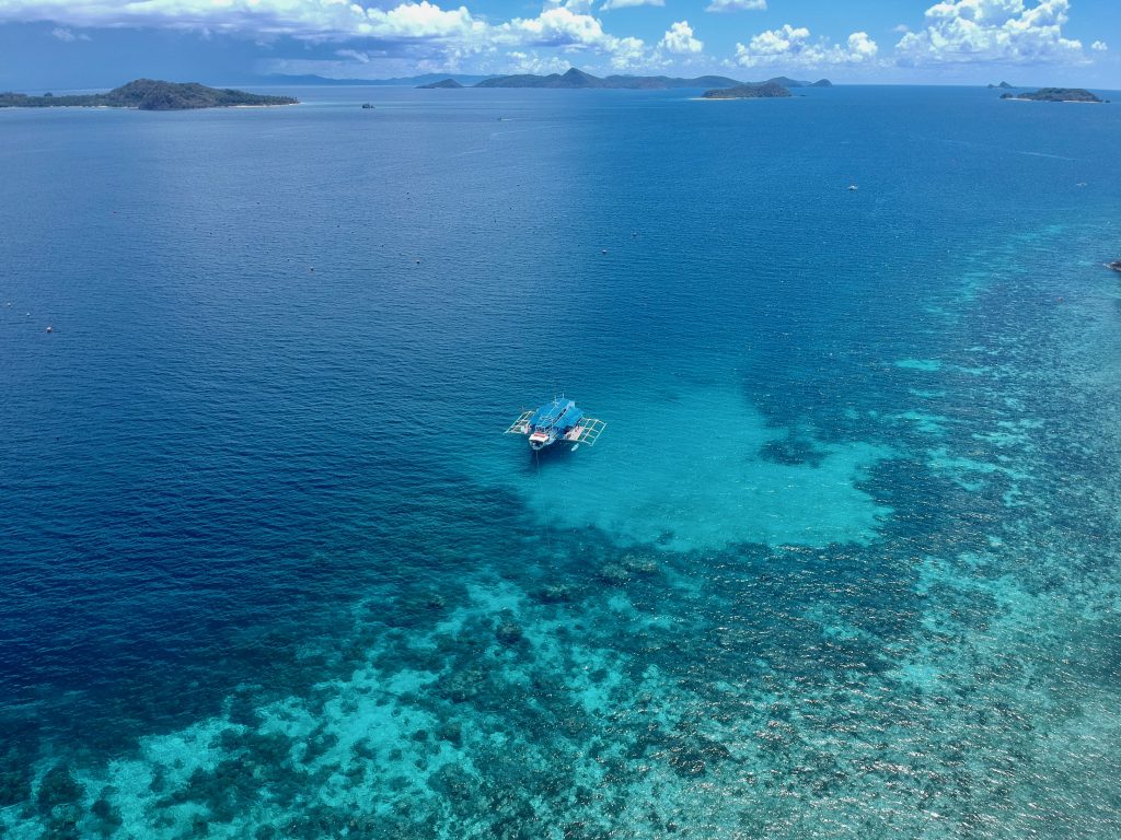 This drone shot shows the Tao Expedition boat.