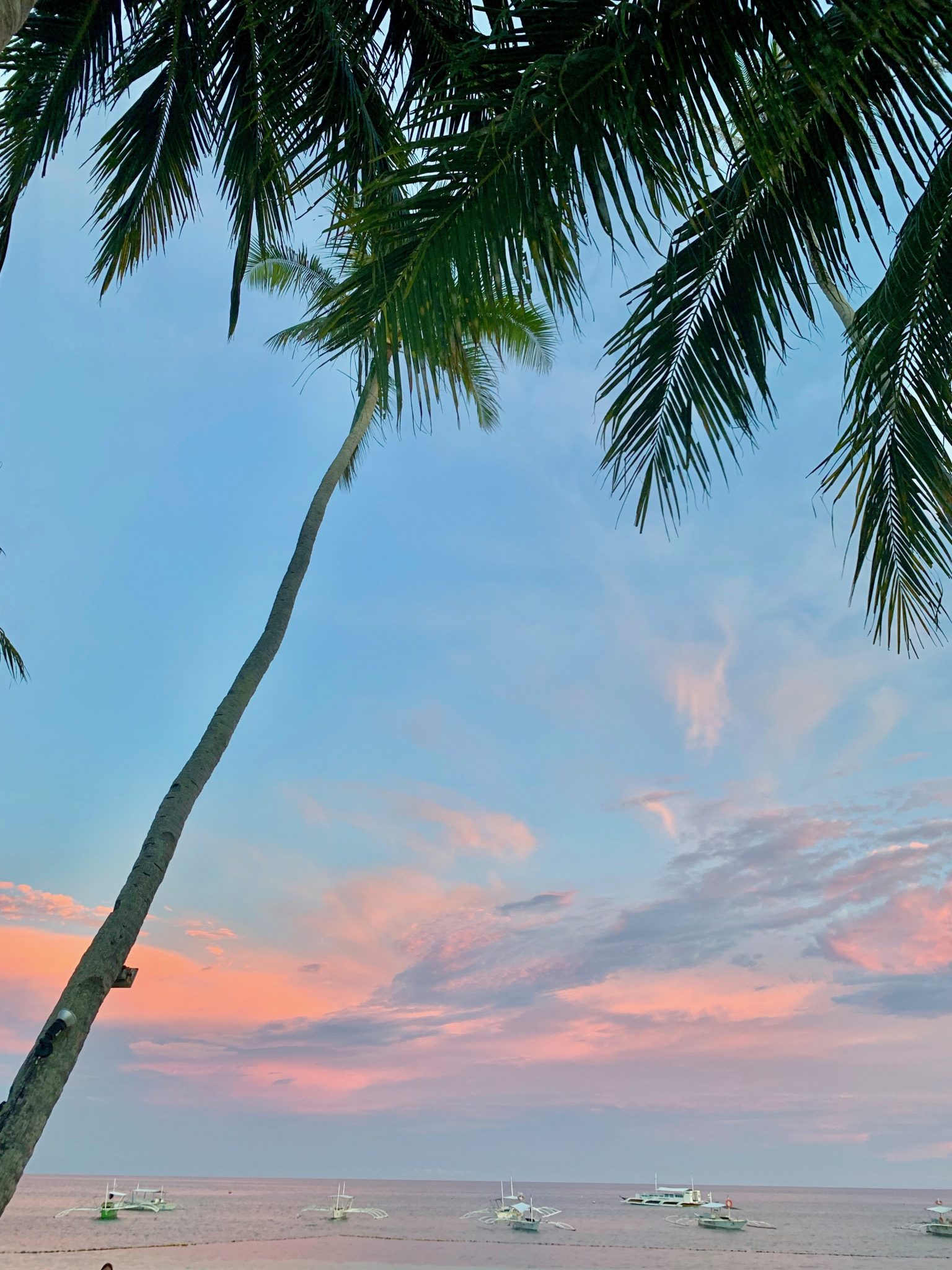 Alona Beach is a popular spot for happy hour and dinner on Bohol Island in the Philippines.