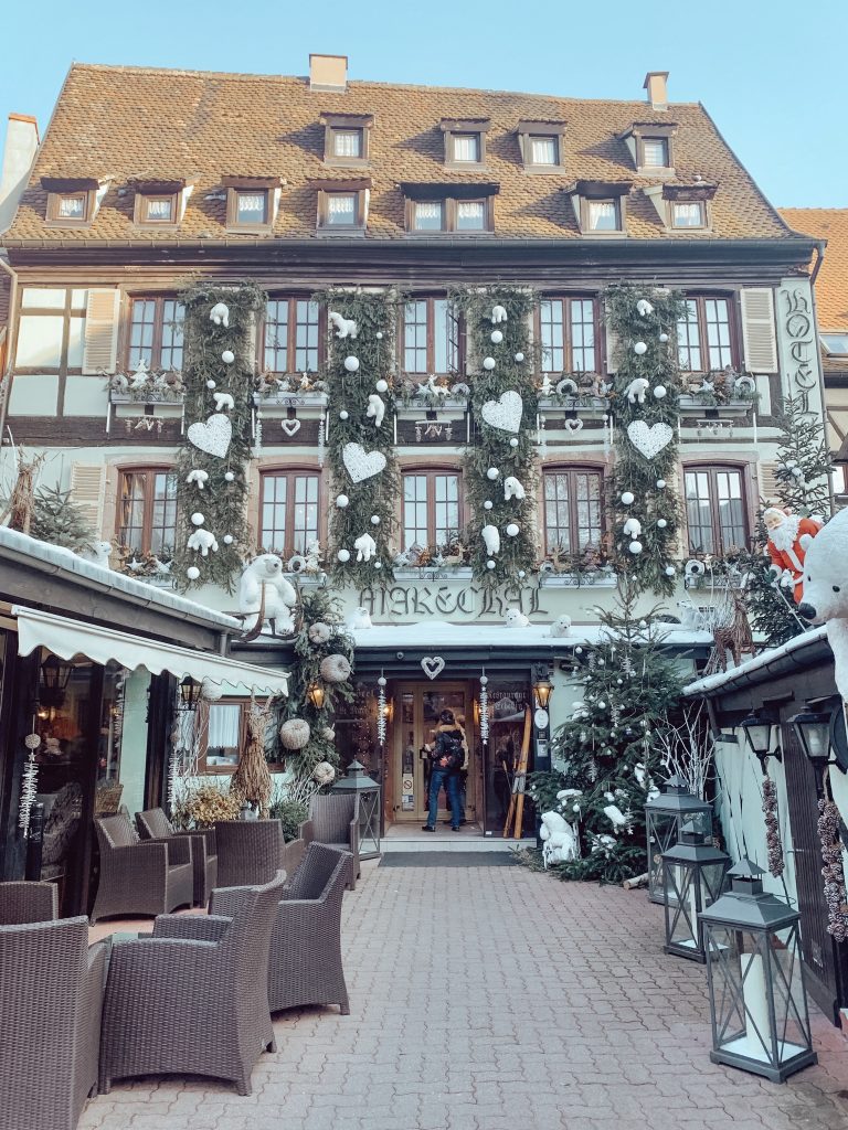 During the Christmas season, the front of Hotel le Marechal in Colmar, France is decked out in decorations.